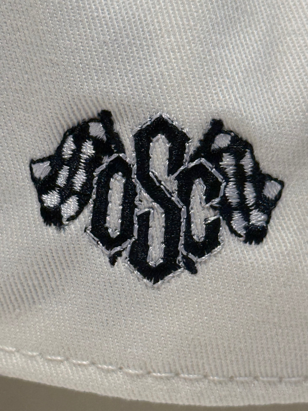 Off White/Black Curved Bill Snap Back Hat